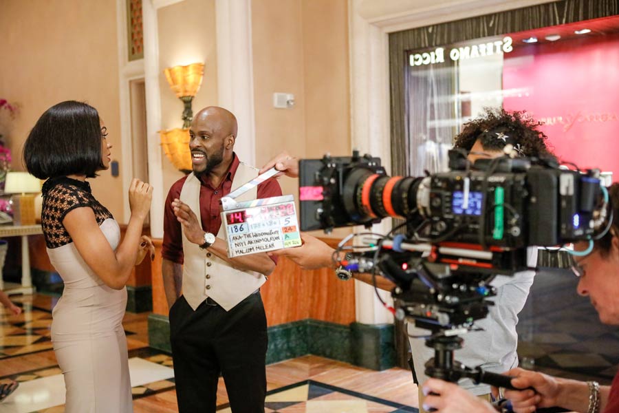 A behind-the-scenes shot in Dubai with Somkele Idhalama and Ikechukwu Onunaku